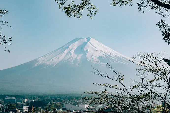 white and black mountain under blue sky during daytime